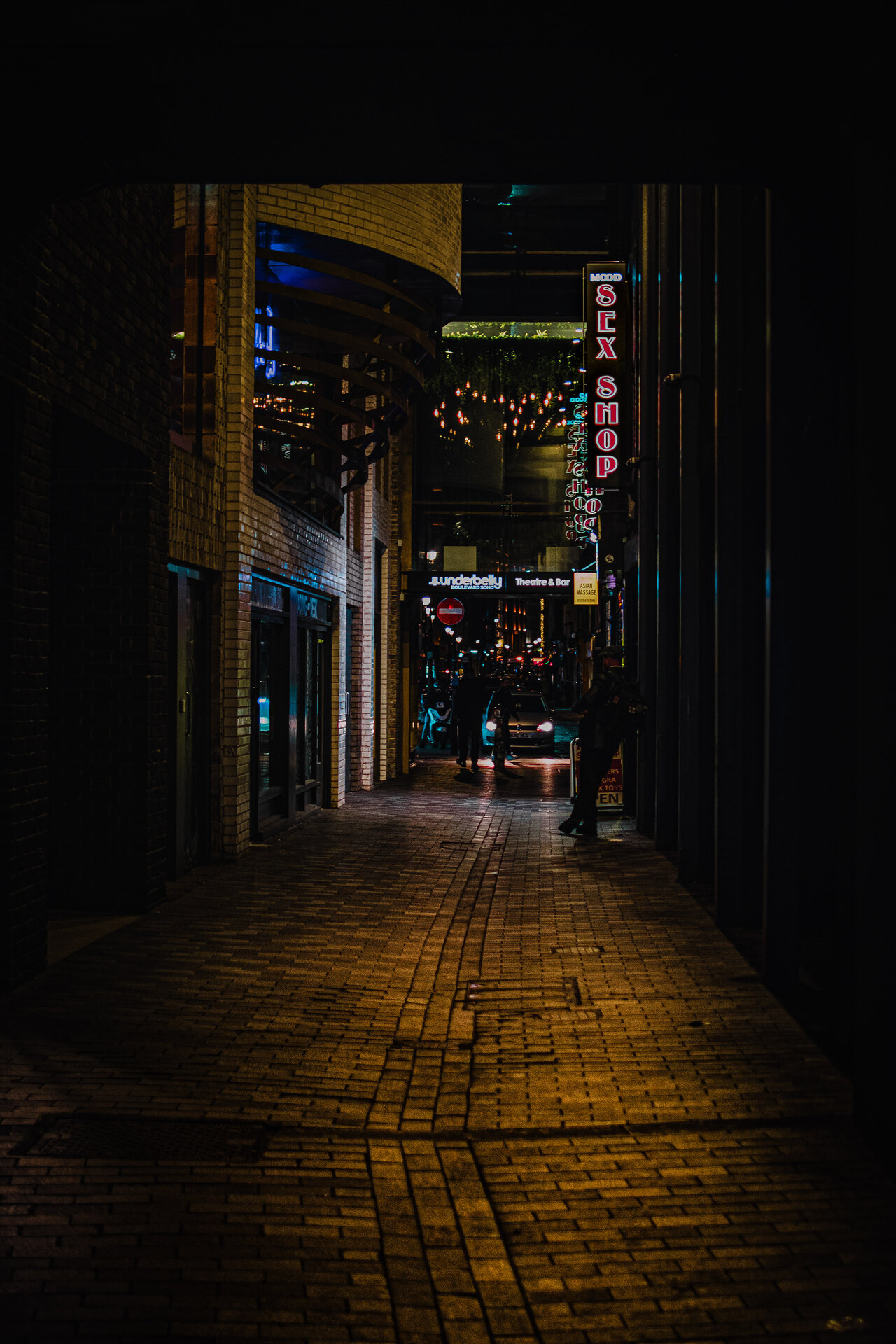 Dark figure in a Soho alley — London After Dark