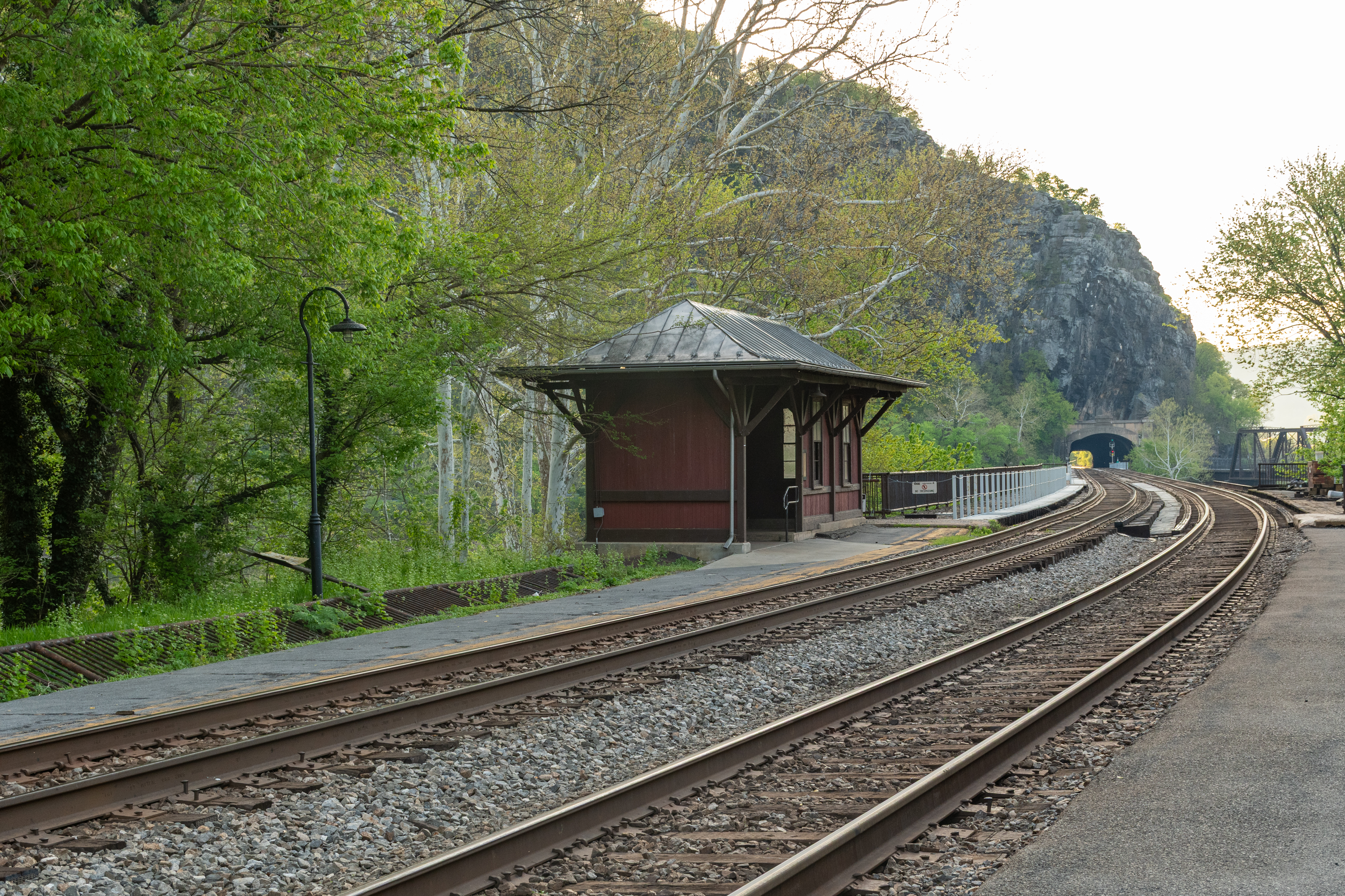 Harpers Ferry railroad tracks receding toward a tunnel